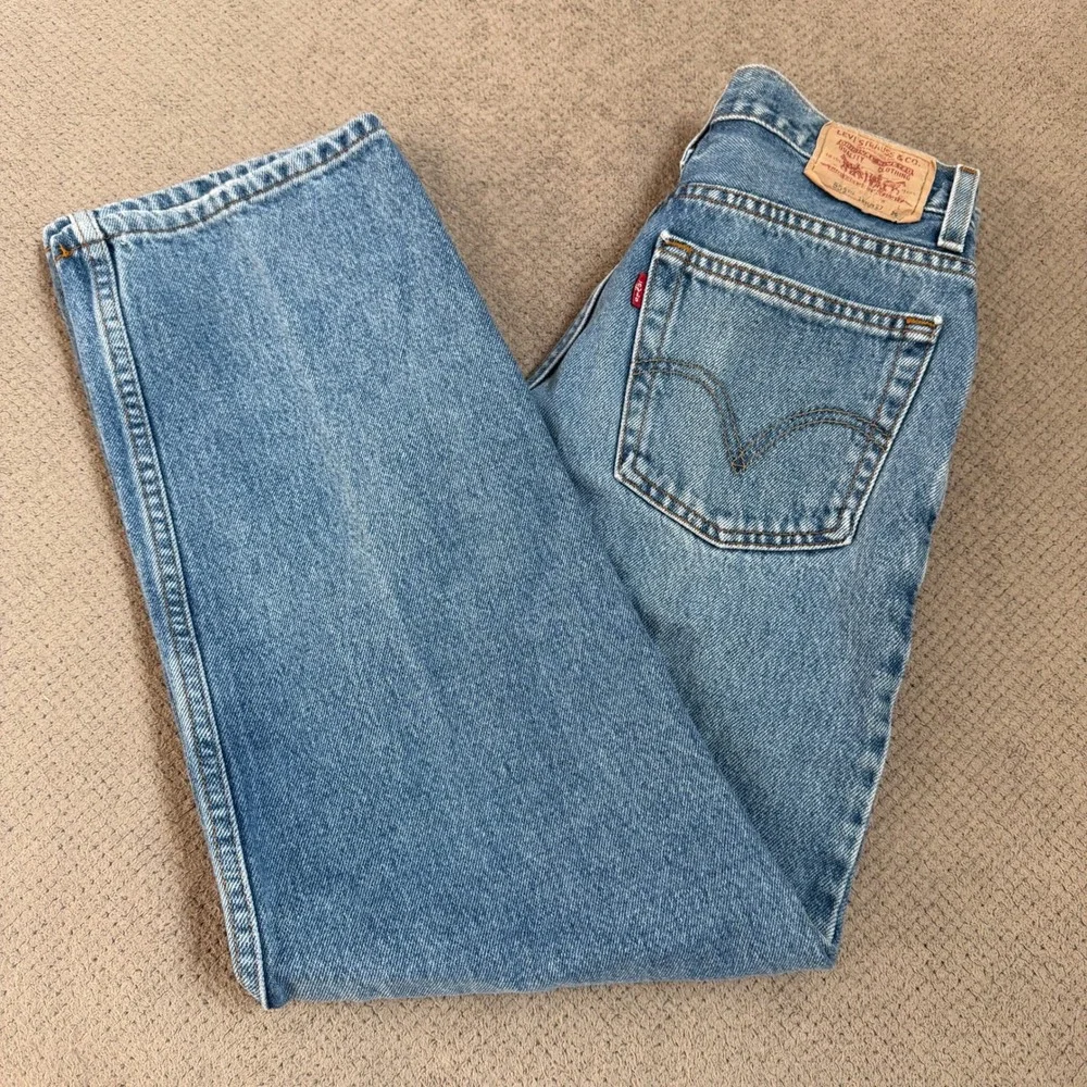 Vintage 1990s Levi's 550 Relaxed Fit Jeans Medium Wash Denim 27x29 18 Slim
